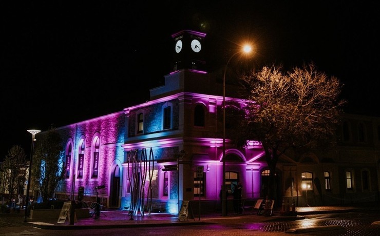 Murray Bridge Town Hall bathed in purple and blue lights for the Adelaide Fringe