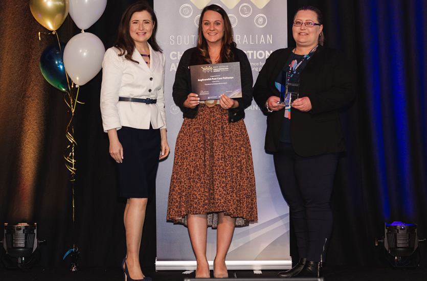 Anglicare SA accept the award from Minister Rachel Sanderson